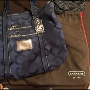 Coach purse, purple & a yellow inside. Gently used